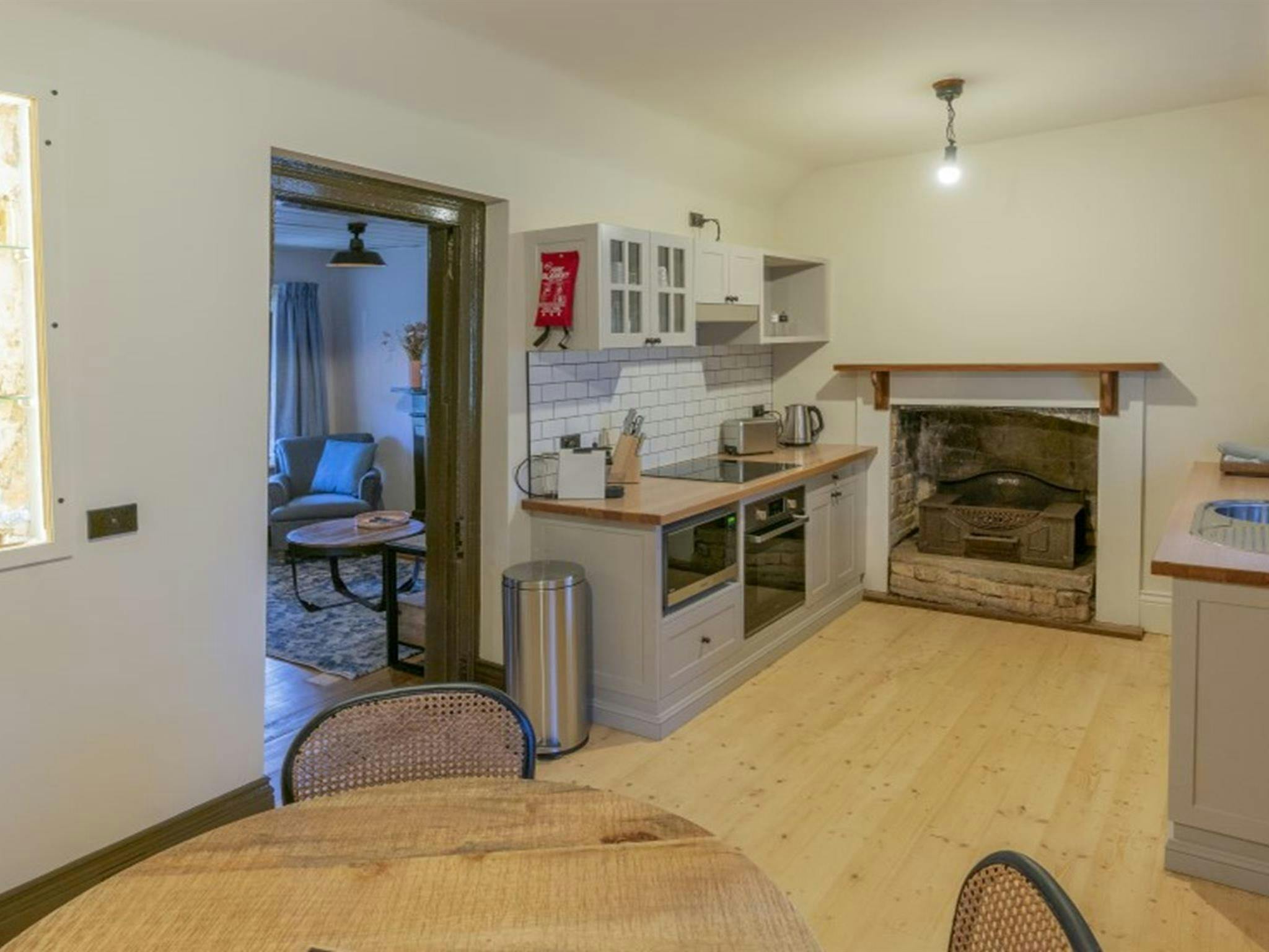 The kitchen and dining area in Fairfax House, Hill End Historic Site. Photo: John Spencer &copy; DPE