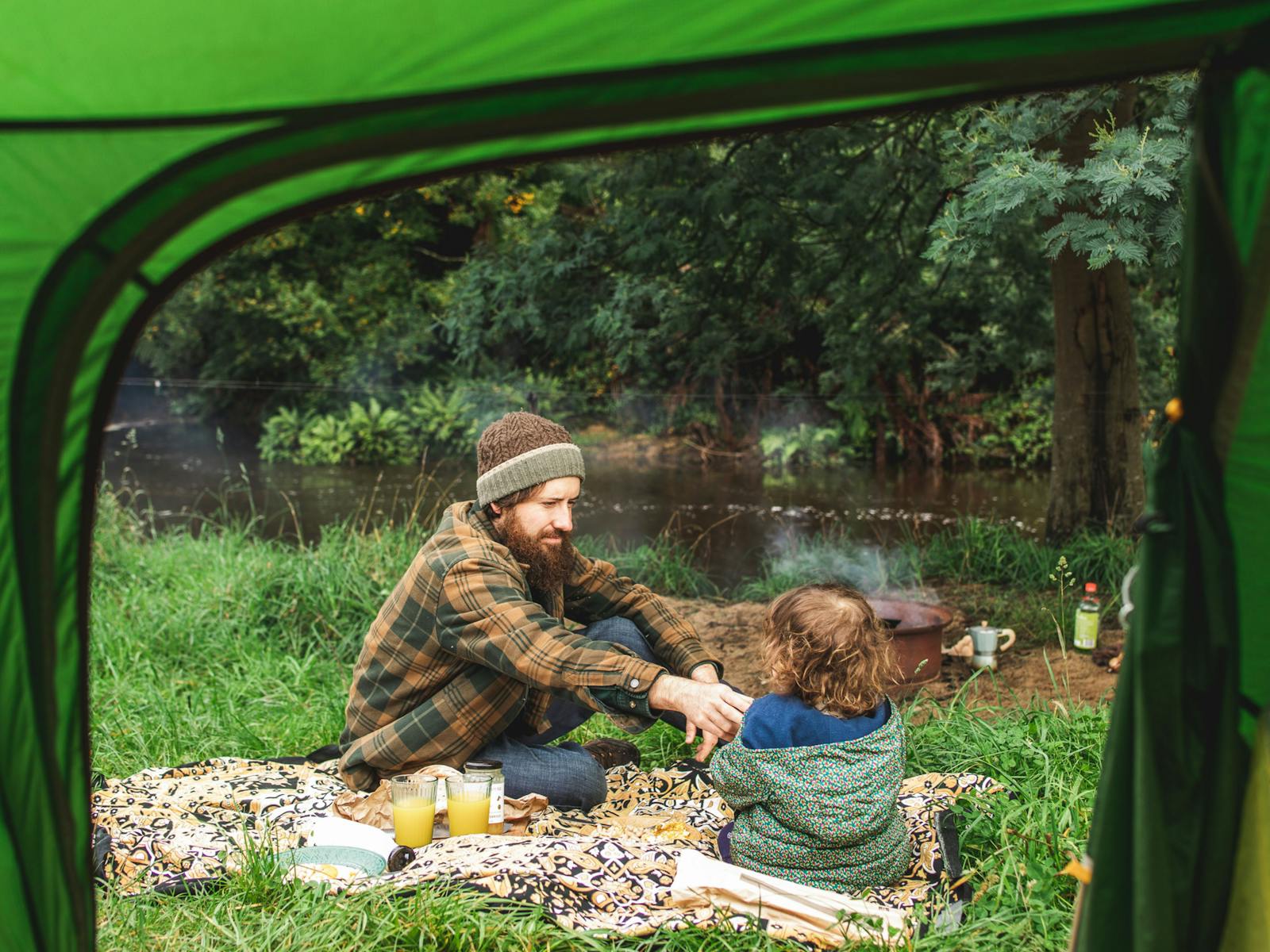 Enjoying a family breakfast with delicious treats from the farm and the sound of the river