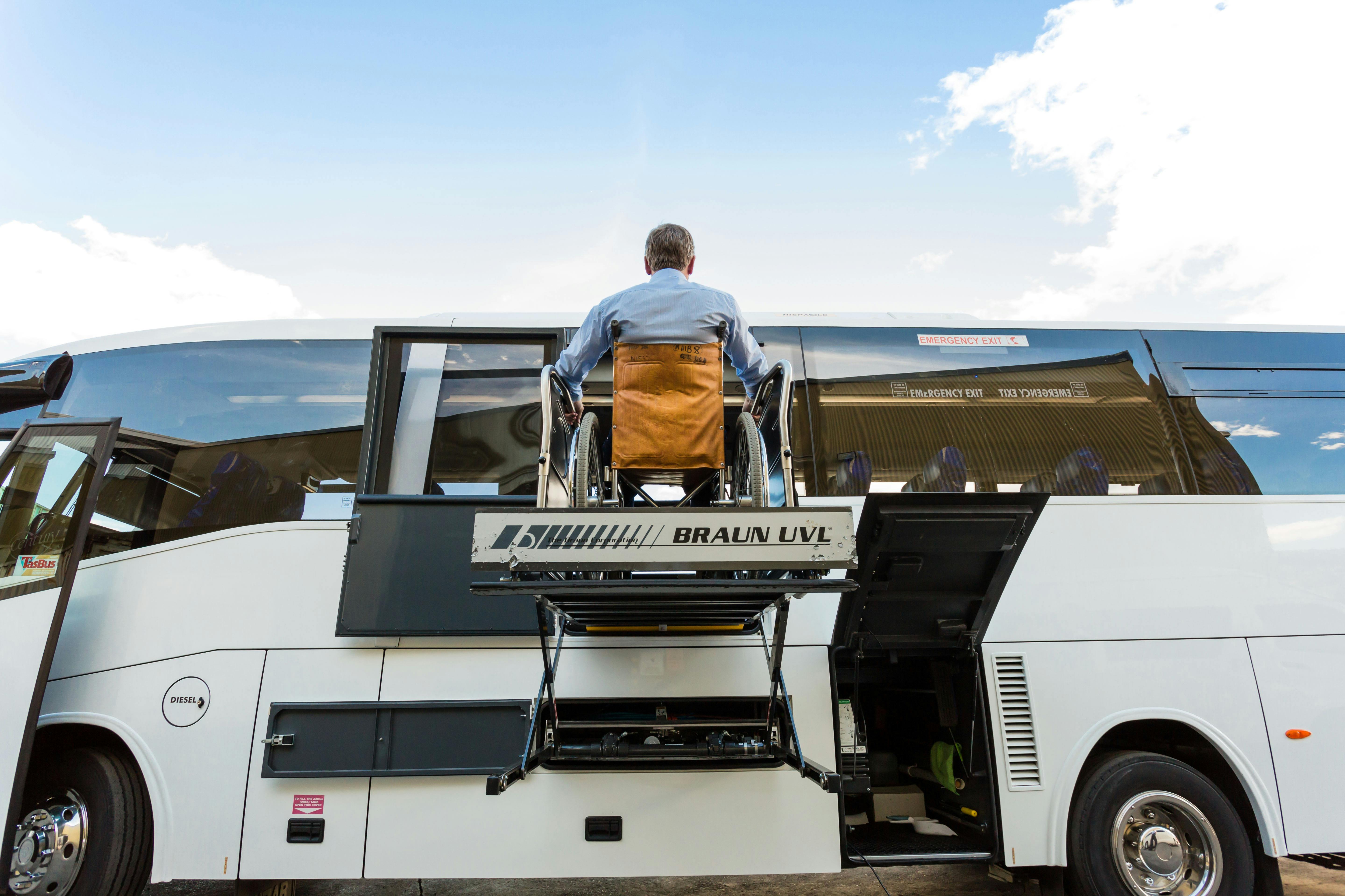 Side loading hoist into coach