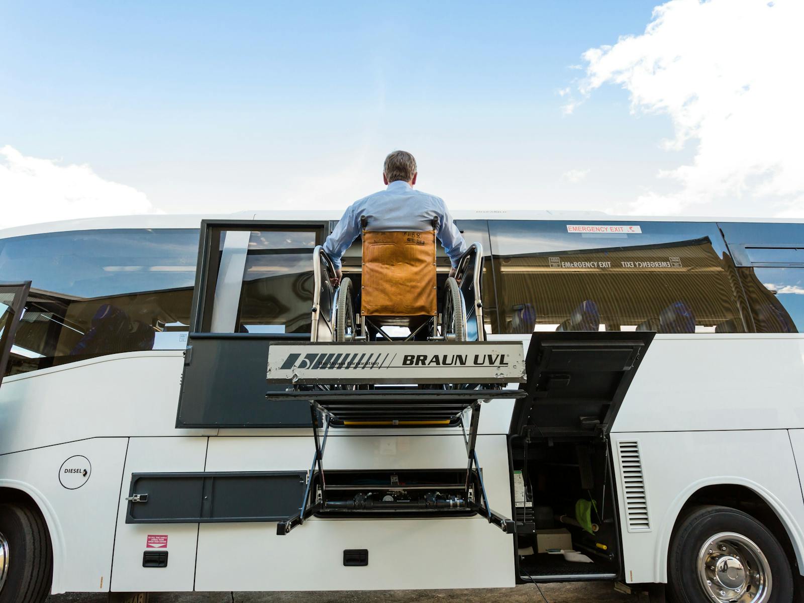 Side loading hoist into coach