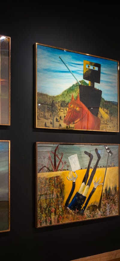 Nolan Collection at Canberra Museum + Gallery someone observing the artworks