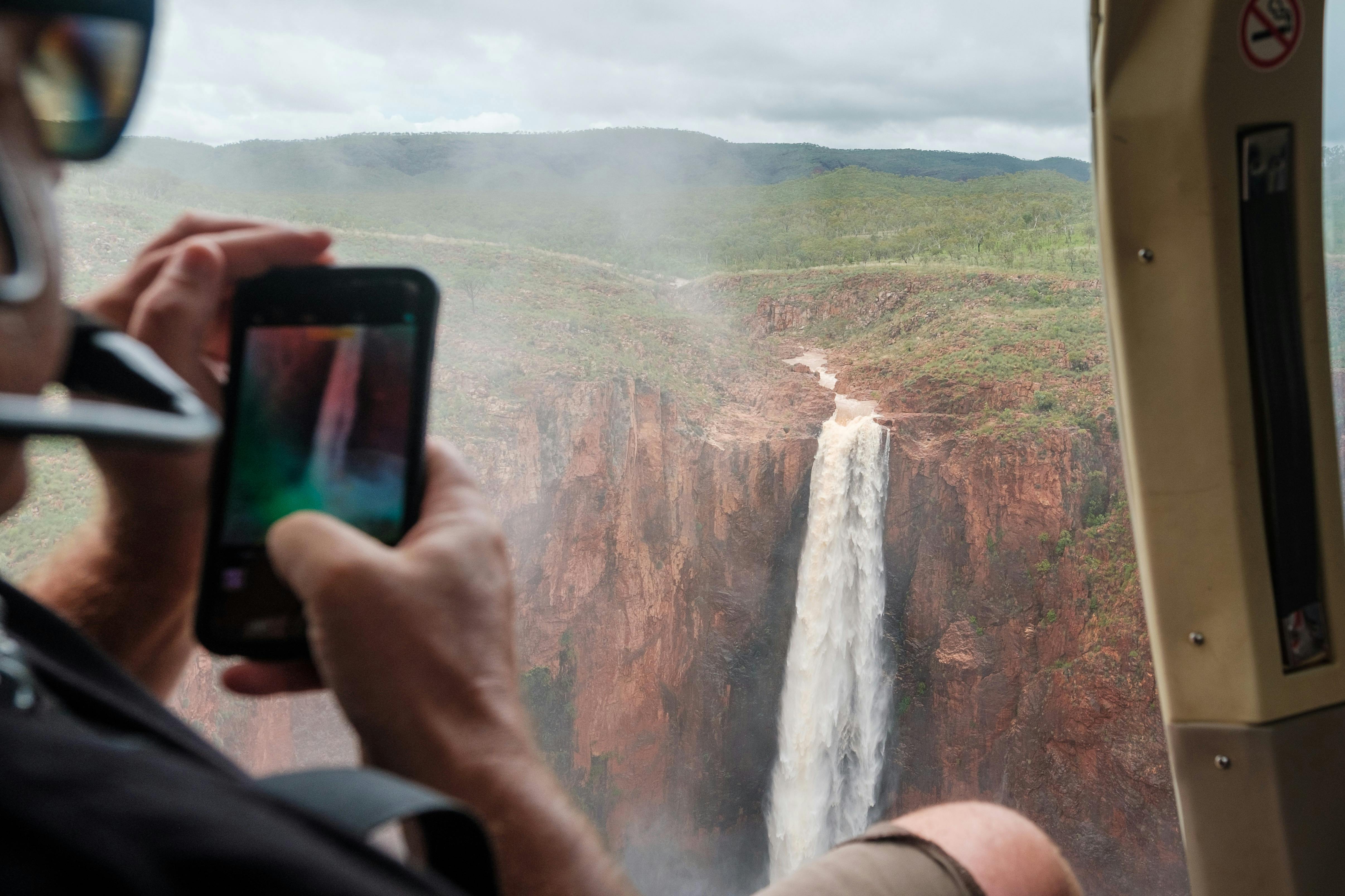 Flying over Revolver Falls. Shot from within helicopter