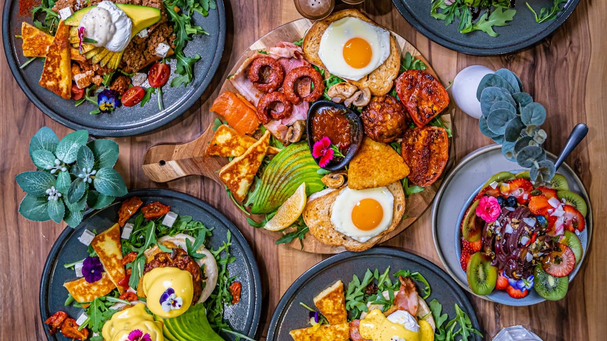 Assortment of breakfast dishes on a table Assortment of breakfast dishes on a table