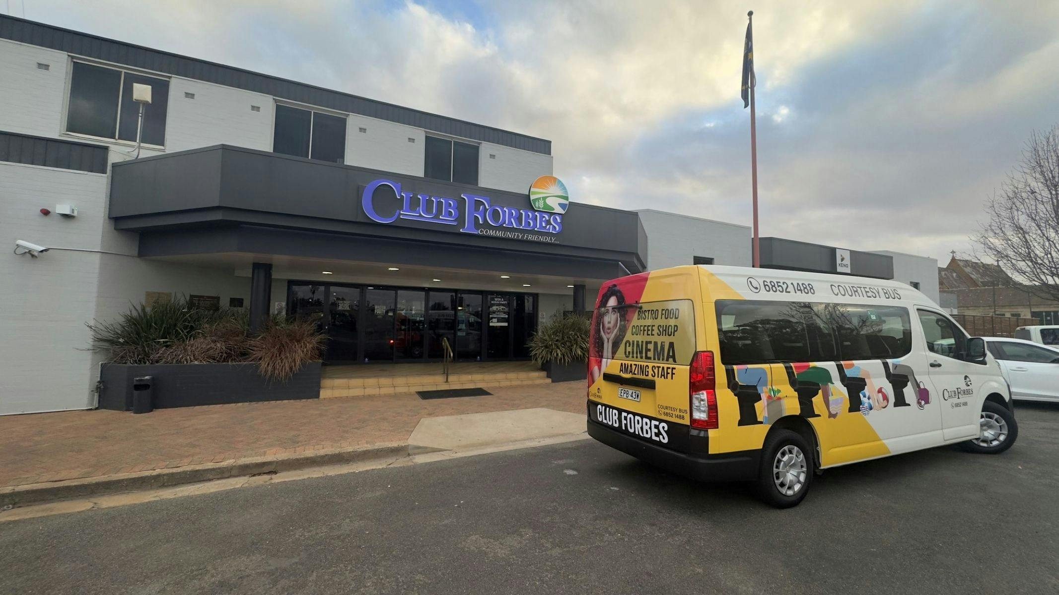 Club Forbes entry with courtesy bus in foreshot