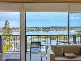 Take in the stunning panoramic lake views and Bar Beach from lounge room or large private deck.