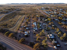 A sunset arial view of the Caravan Park