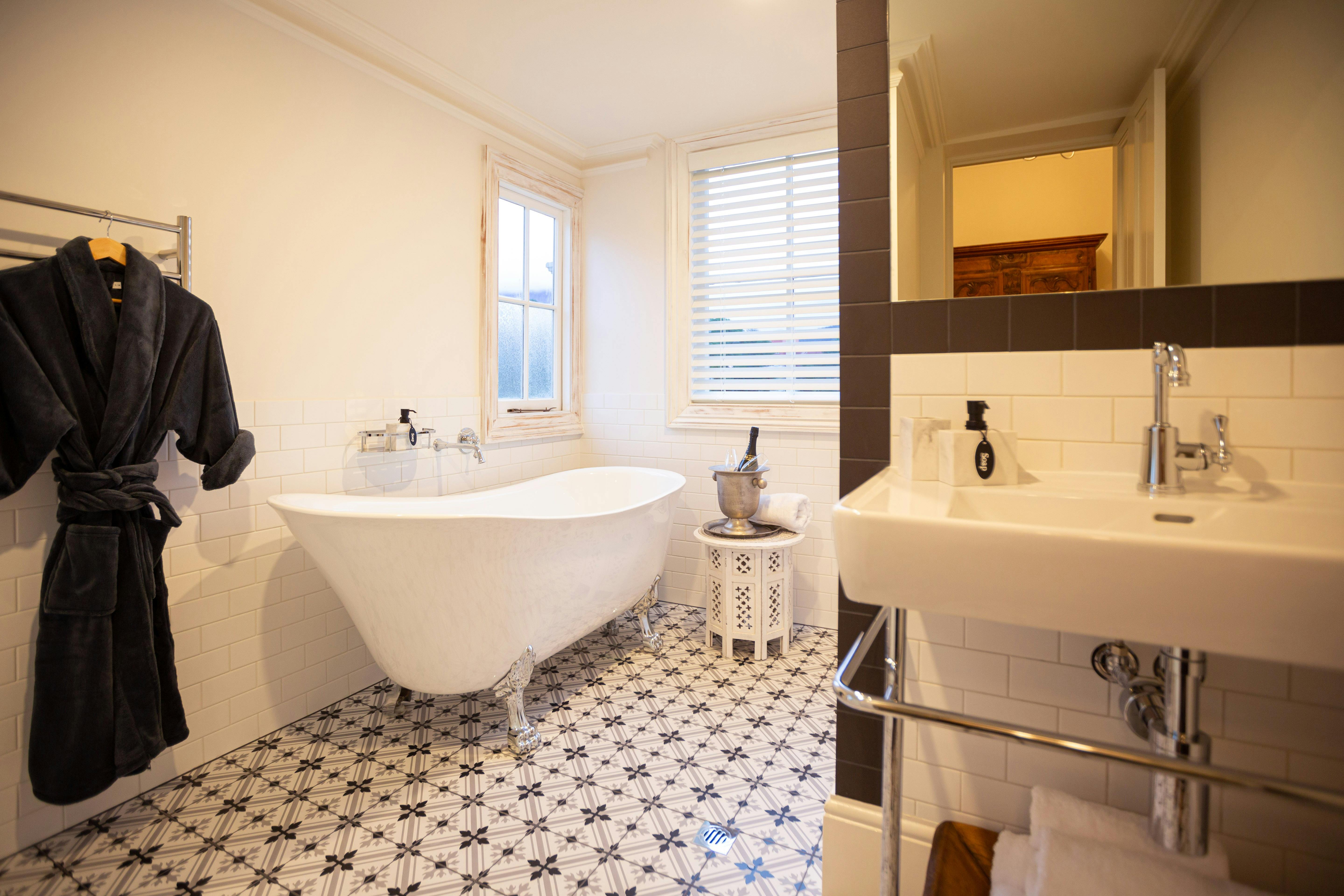 Relax in claw foot bath after a busy day