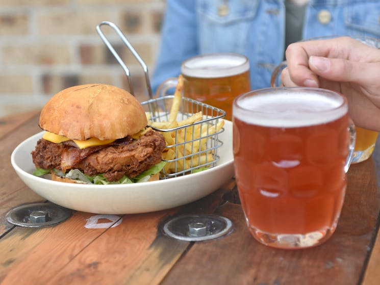 Image of a beer and burger