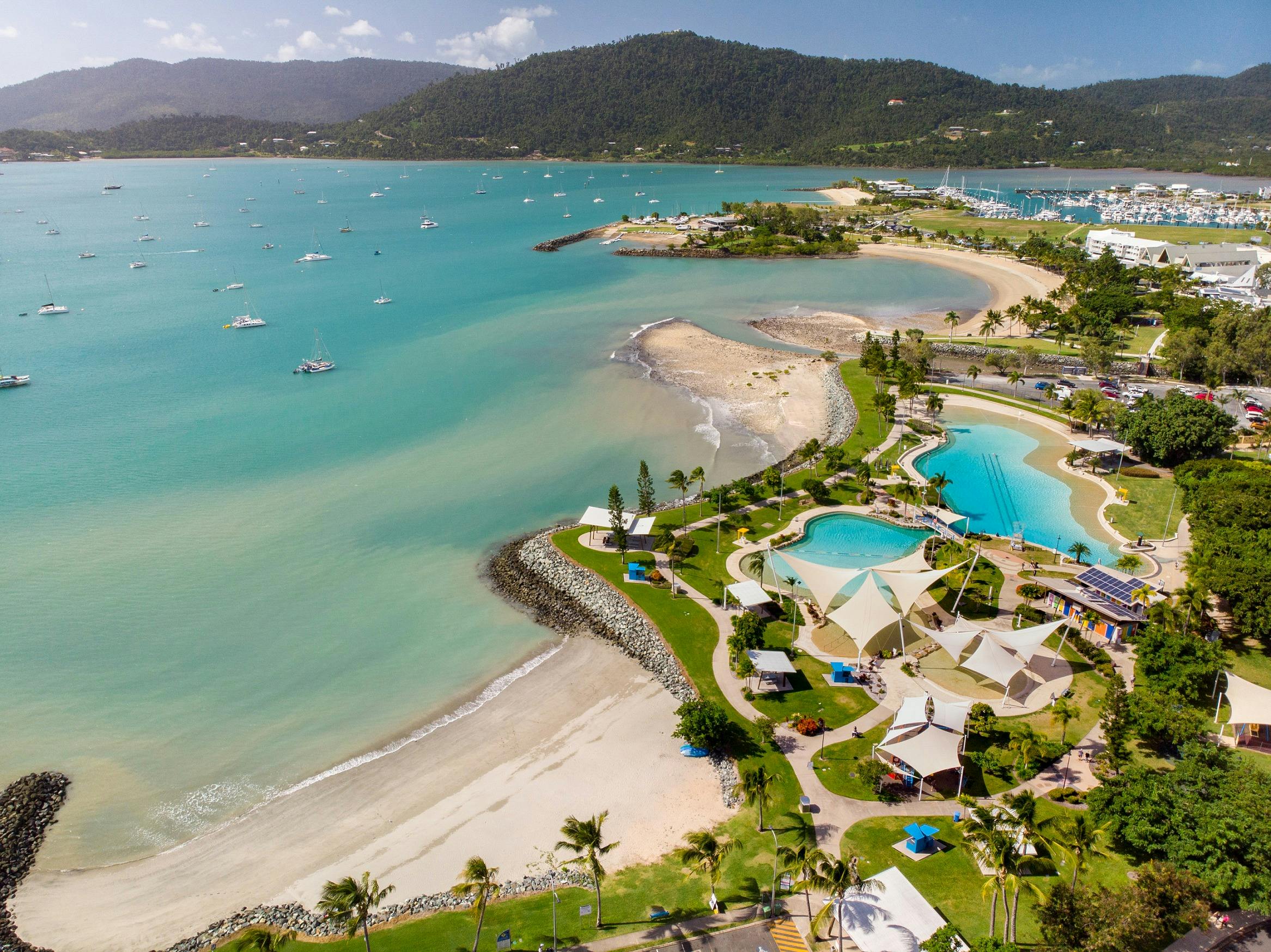 Aerial view of the coast of Airlie Beach and lagoon