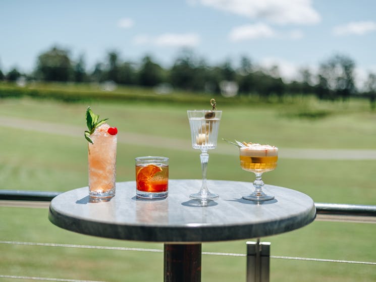 Relax with a cocktail or two and enjoy the views over Roche Estate from the Goldfish Terrace