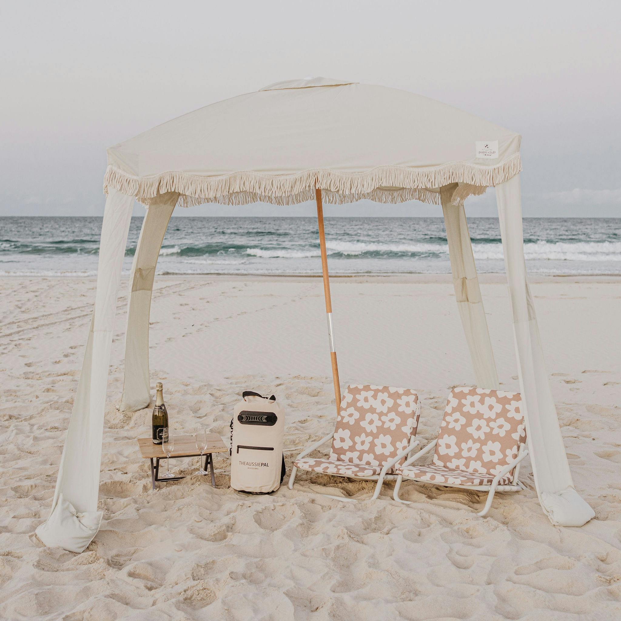 Luxury cabana, chairs & table on a Gold Coast Beach