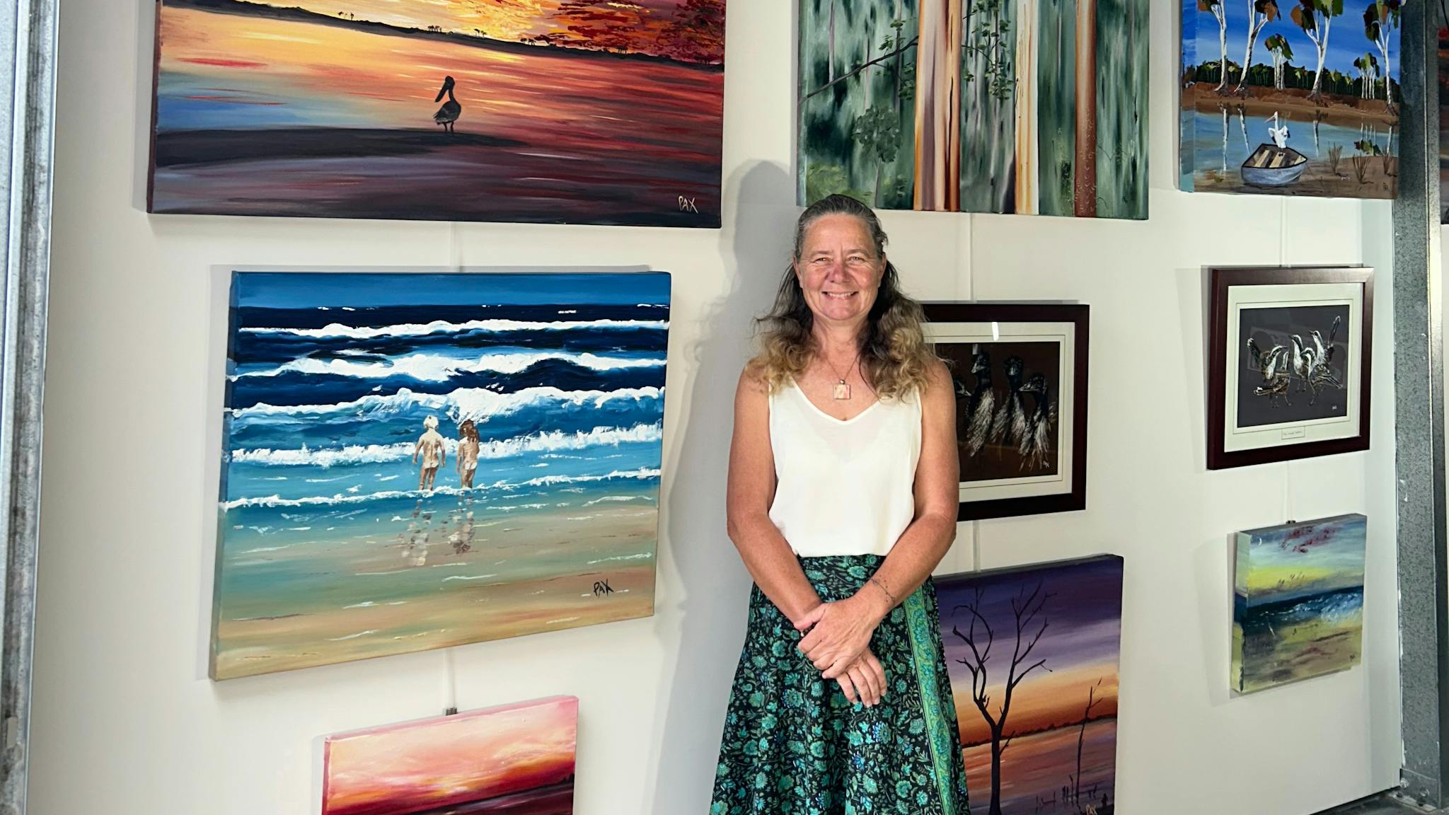 Pax Art Studio Gallery Lakes Entrance with the artist Pax, Caroline Packer Artist standing in front