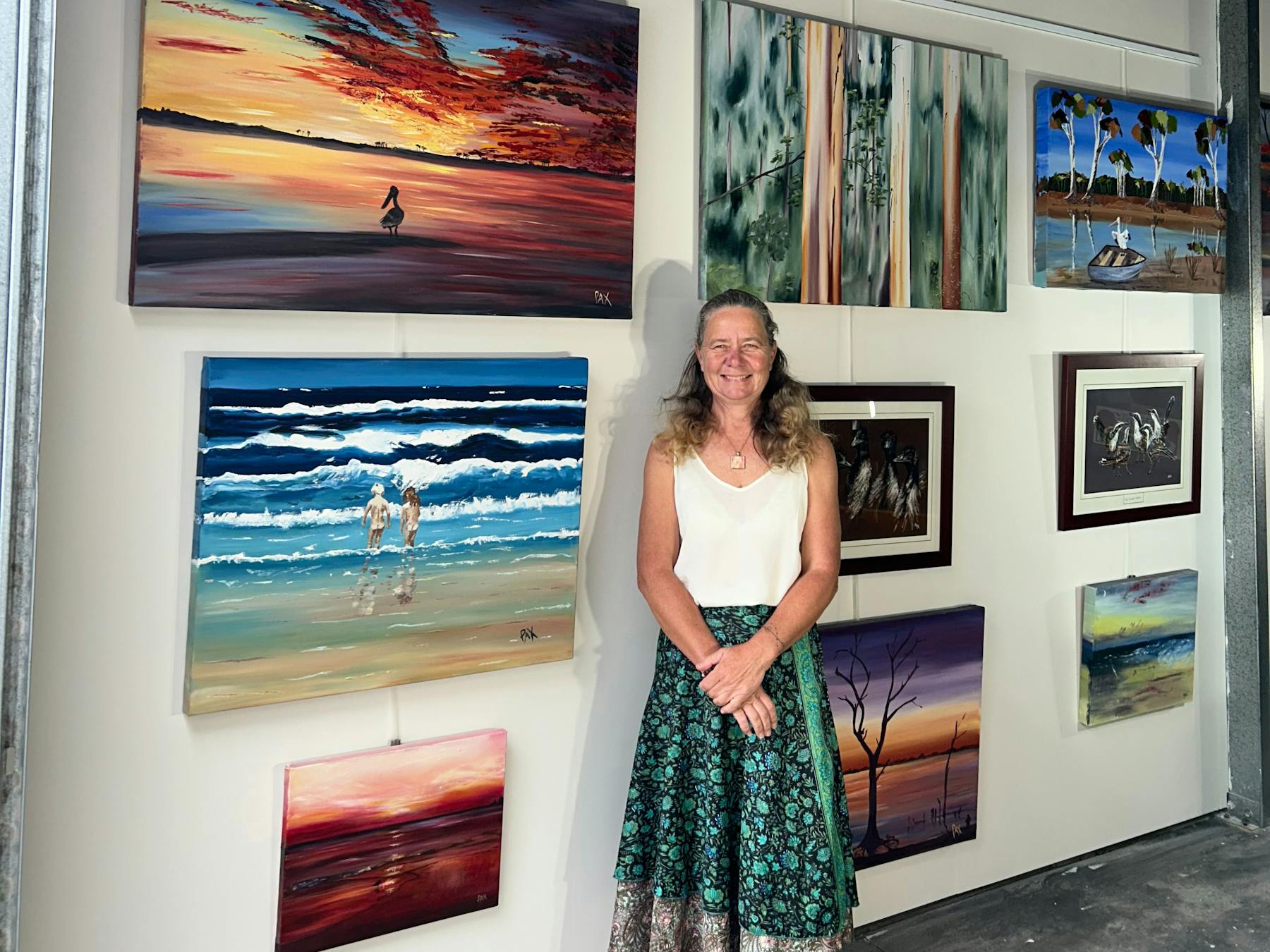 Pax Art Studio Gallery Lakes Entrance with the artist Pax, Caroline Packer Artist standing in front