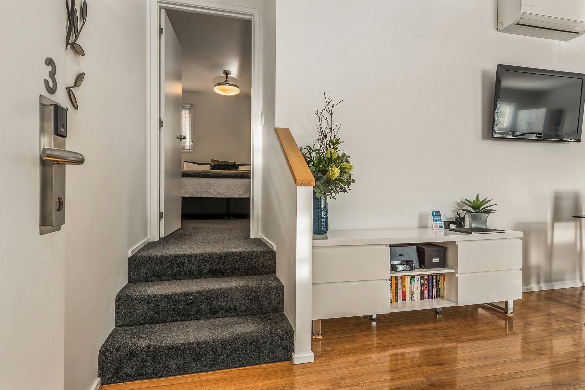 Open the door into split level living, swith three steps to bedroom retreats