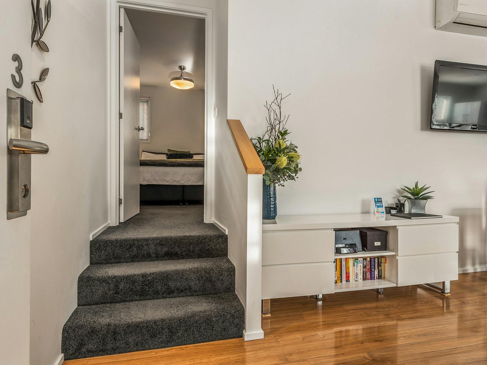 Open the door into split level living, swith three steps to bedroom retreats