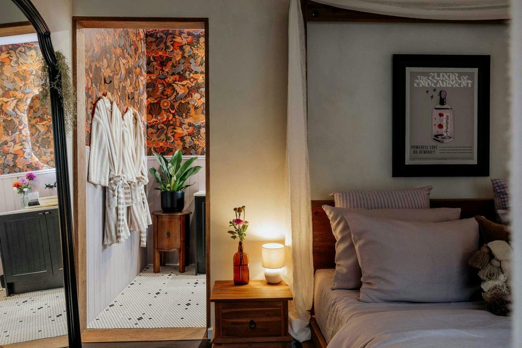 Full sized bathroom with luxurious Country Road robes and Mythical Wallpaper