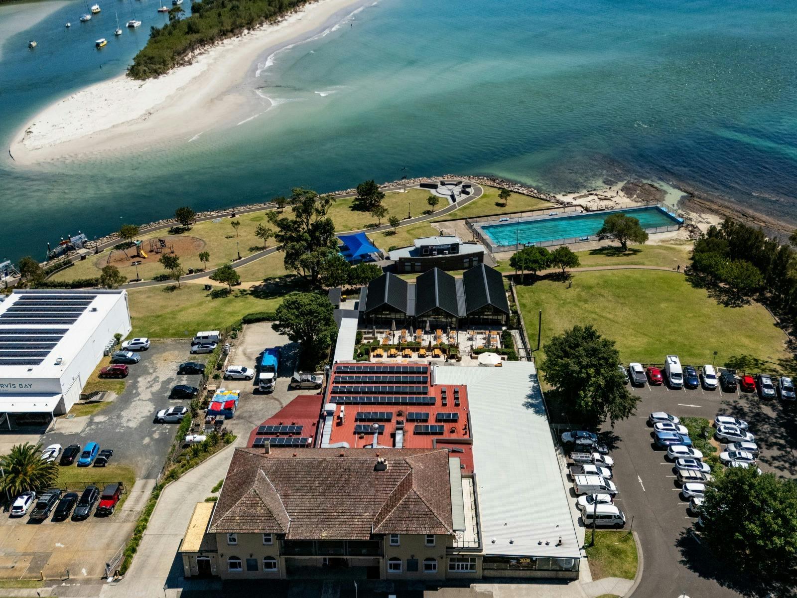Aerial view of Huskisson Hotel on the shores of Jervis Bay