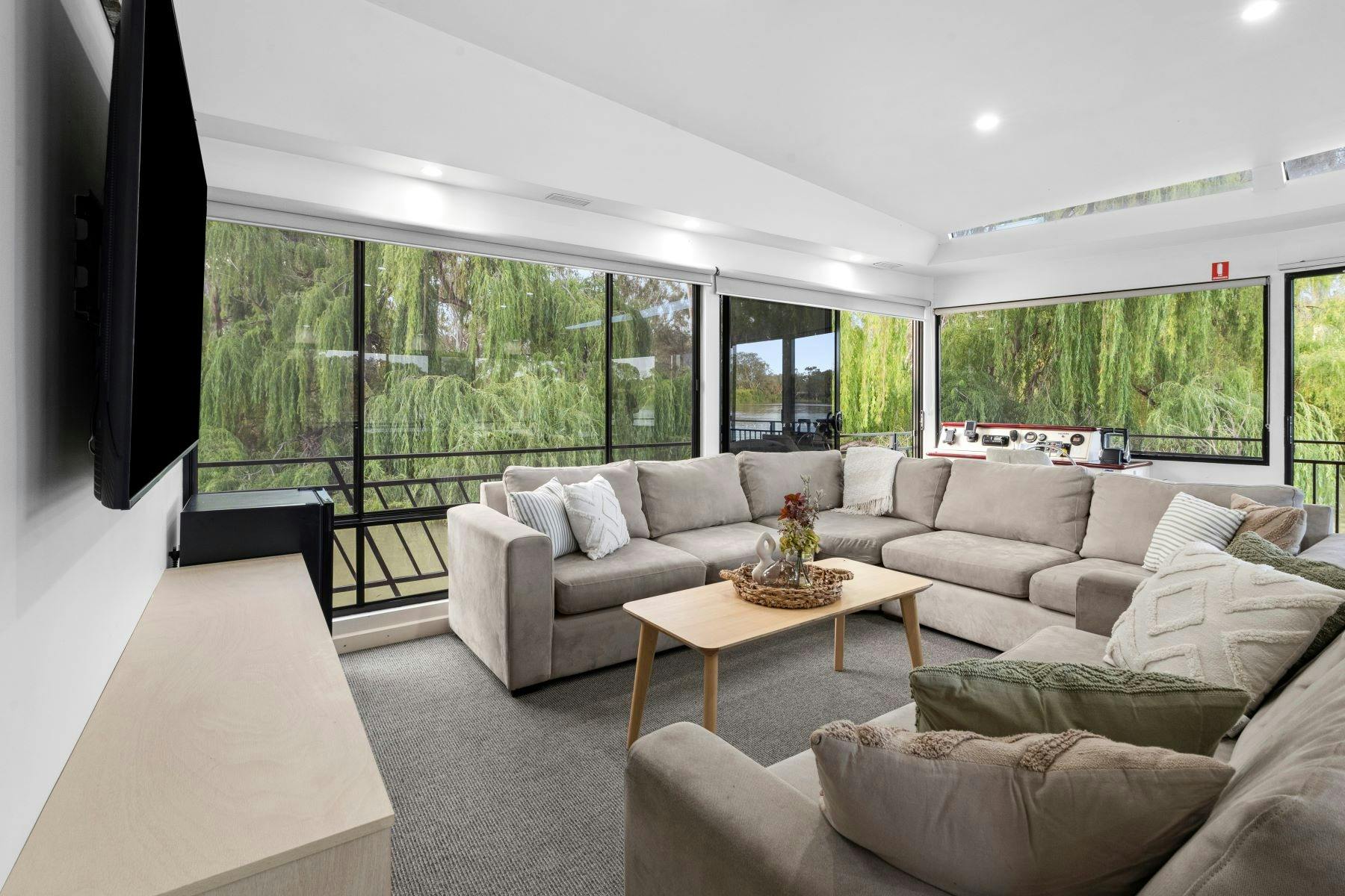 Relax, unwind, and take in the views from Desire’s cozy lounge — comfort meets river serenity.