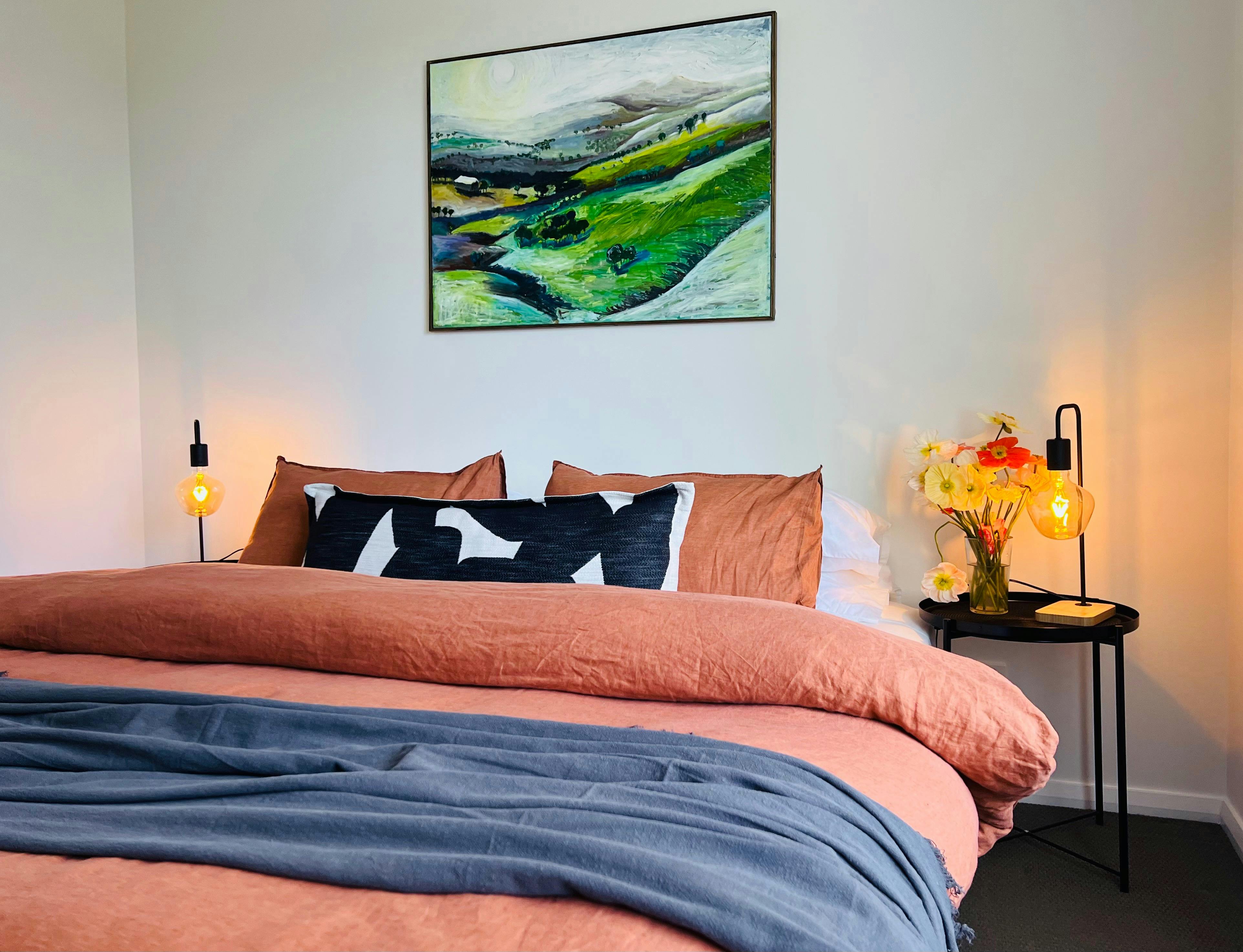 king bed room with art