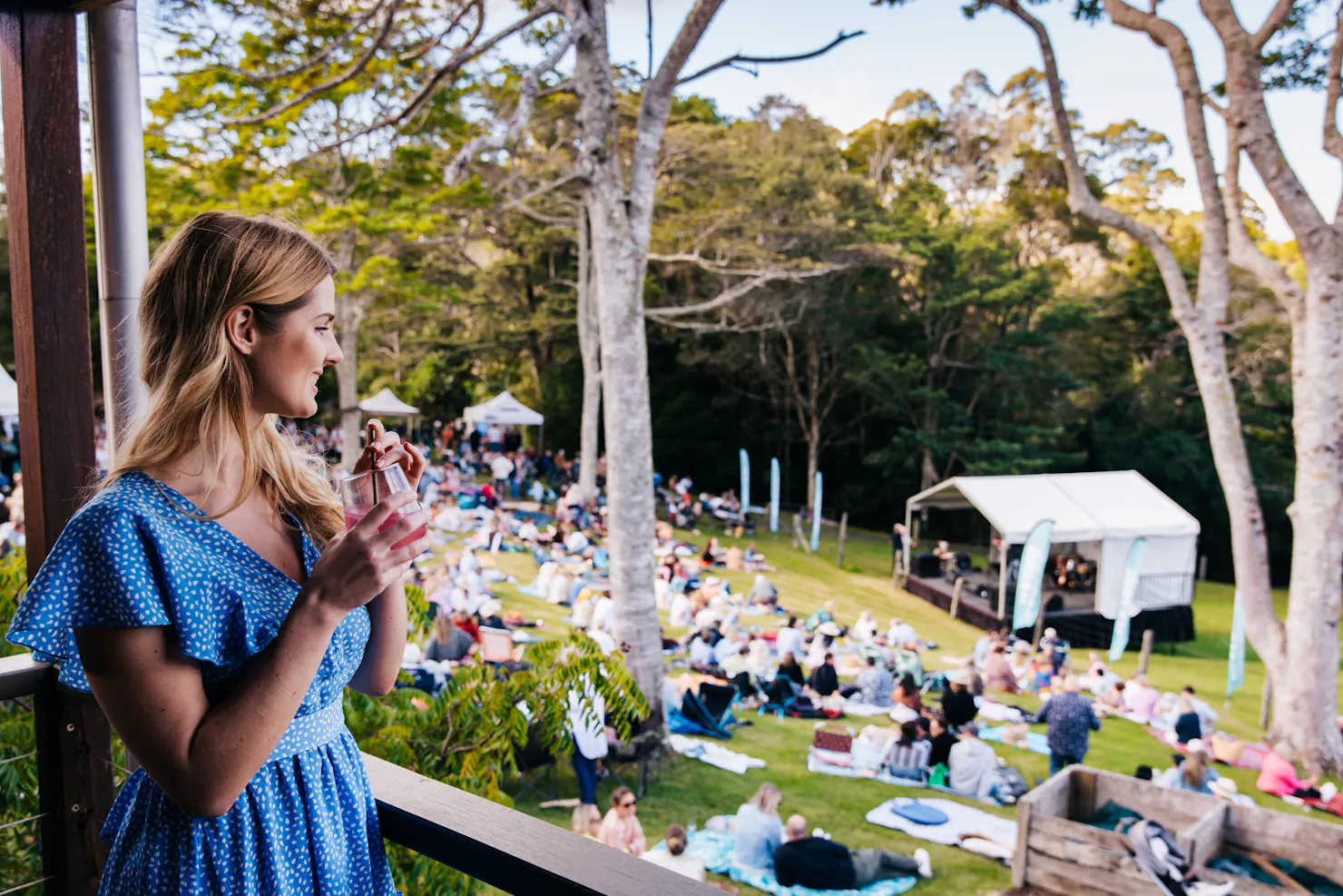 A woman looking over the pavilion to the lawn at Spicers Tamarind Retreat