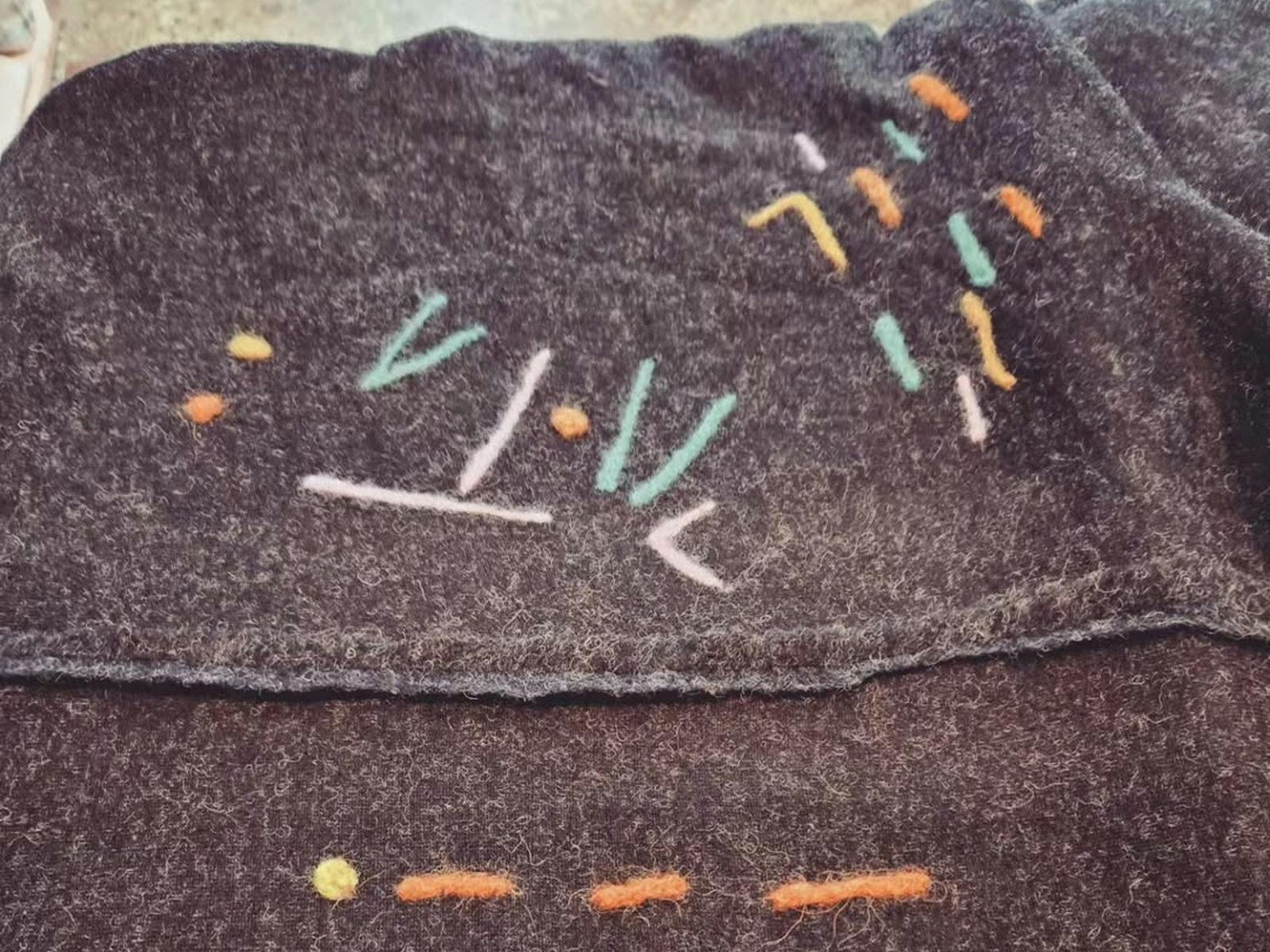 Needle Felting: Mend and embellish a pre loved jumper