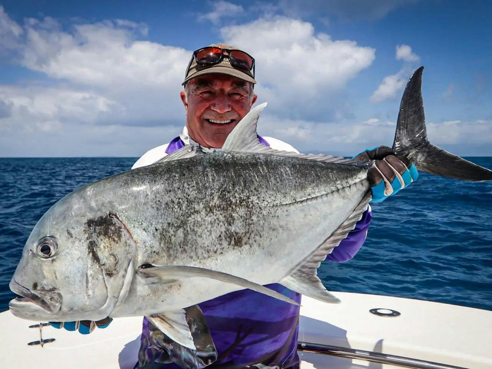 guest holding fish guest holding fish