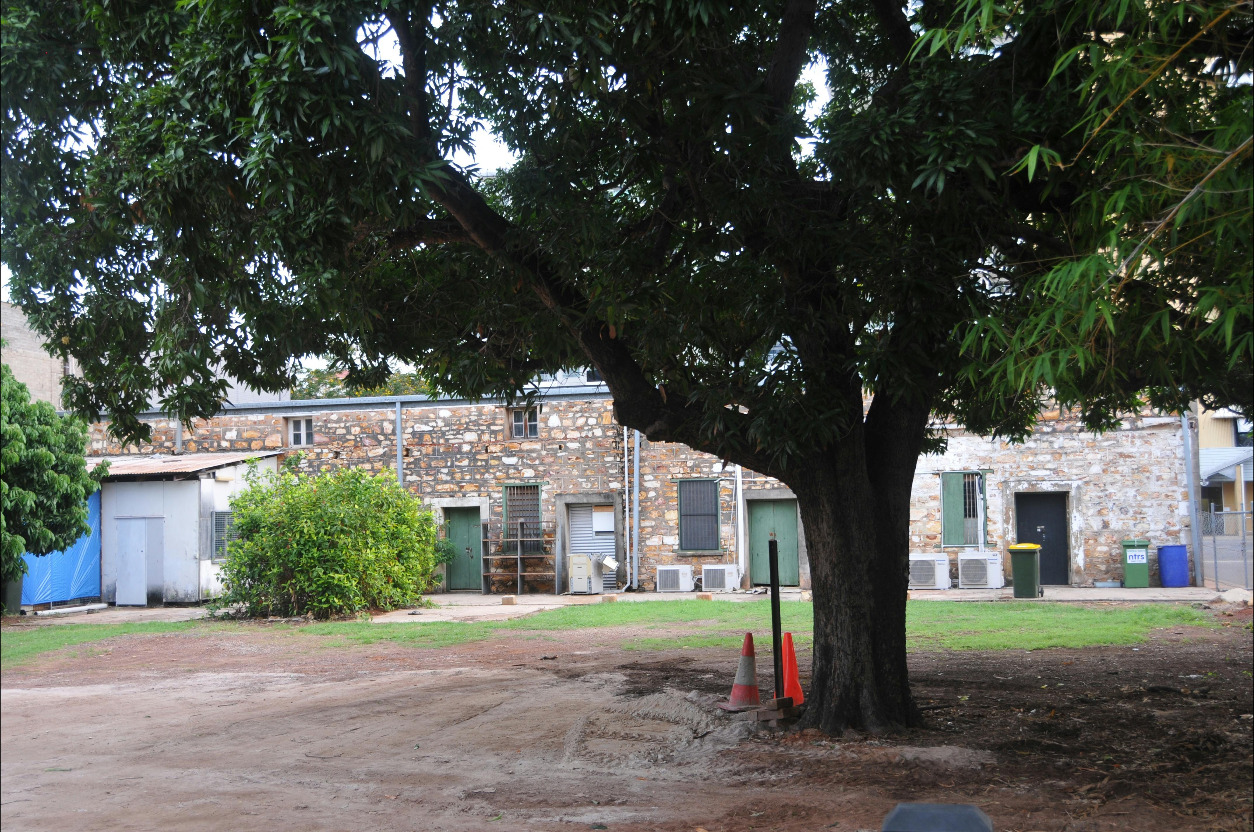 The rear of the building. There is evidence of other structures fixed
