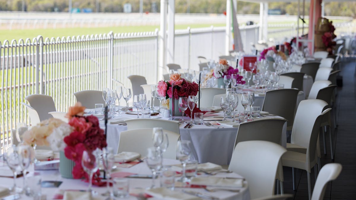 Champagne Garden with table settings  and floral centre pieces