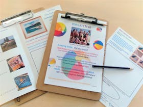 Worksheets on clipboards with pencils.