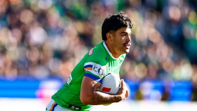 Canberra Raiders player Matthew Timoko running the ball.