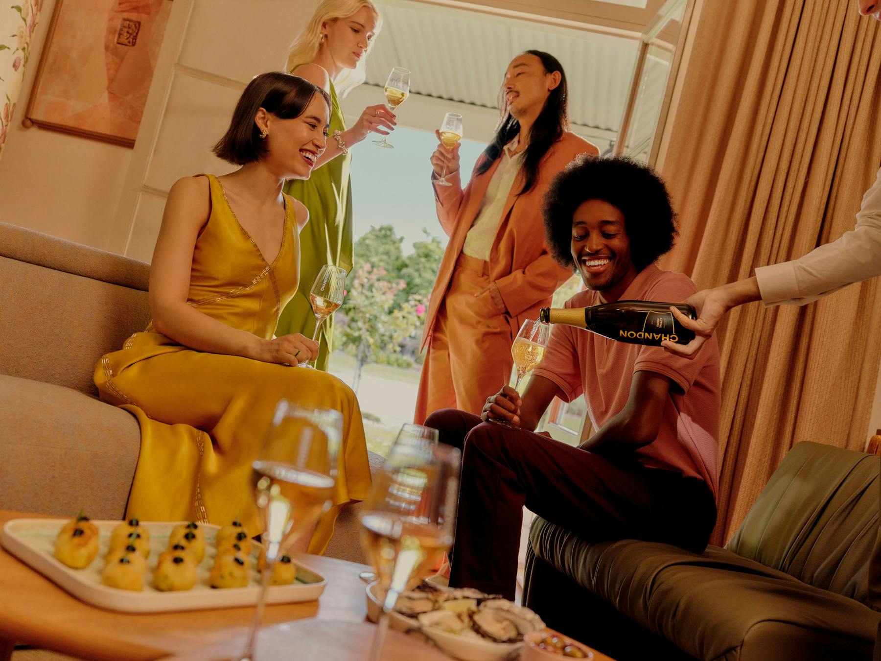 A group of people sharing hospitality in the private homestead space