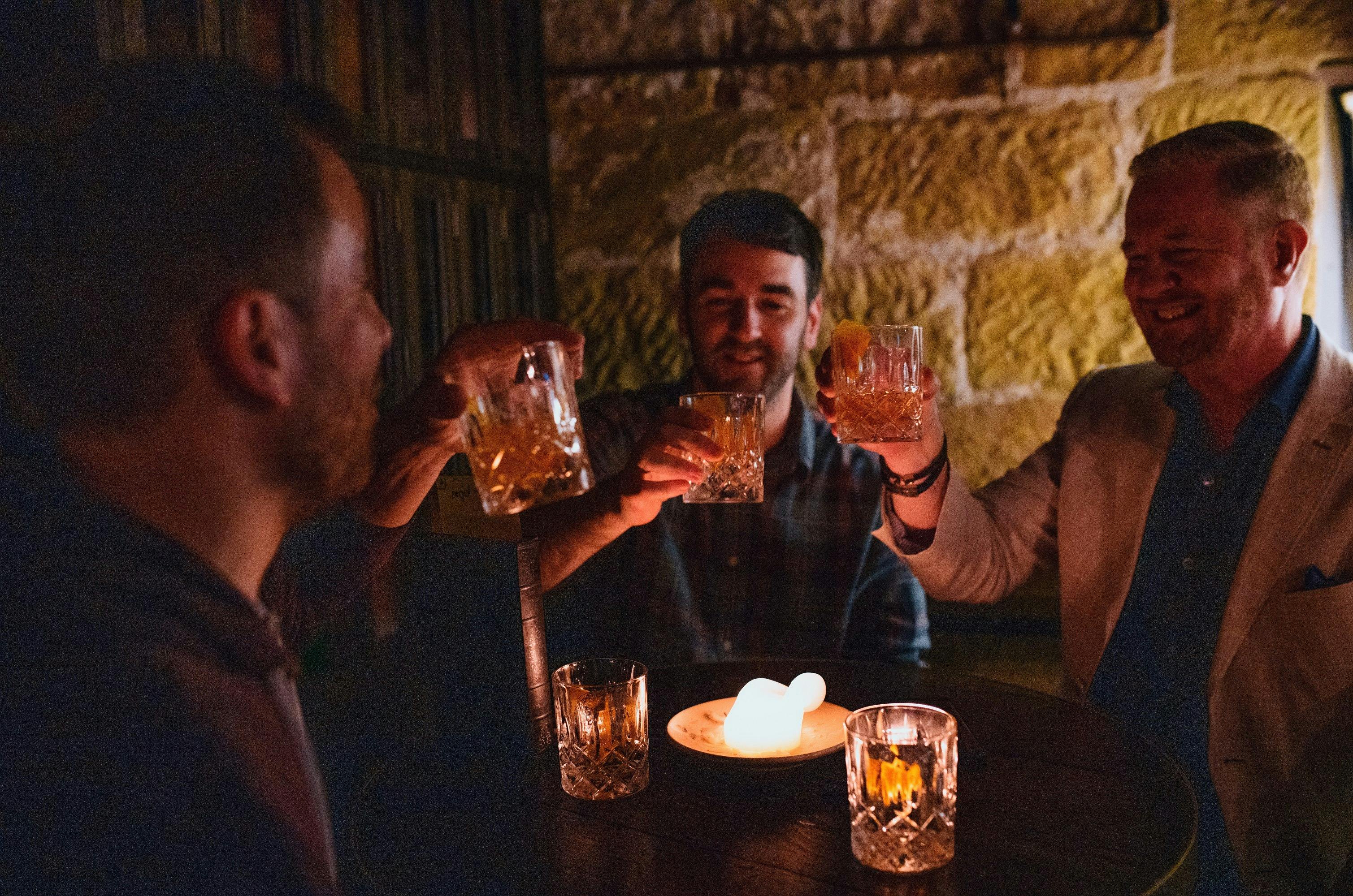 Friends enjoying beverages at The Doss House, The Rocks