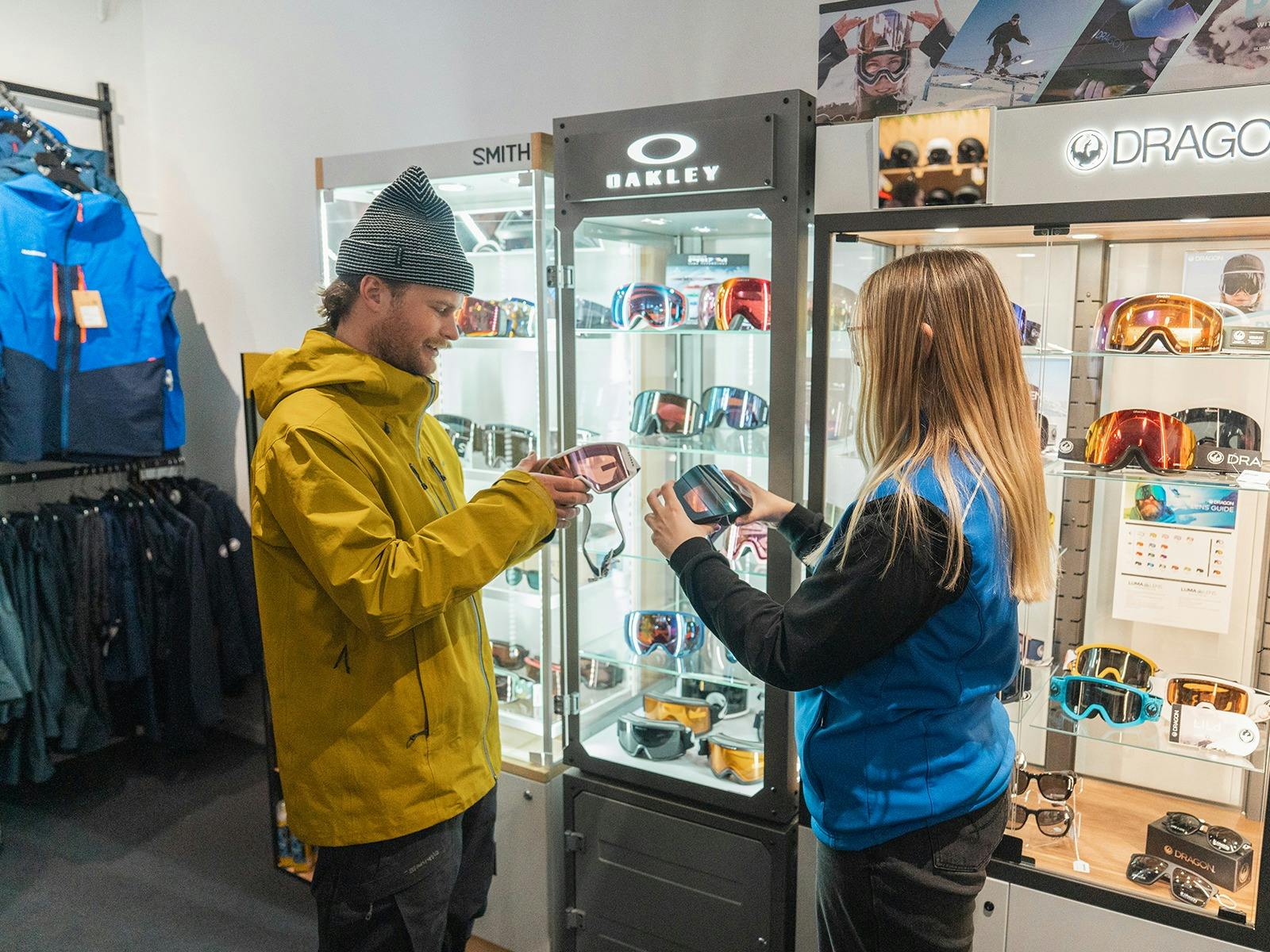 retail worker helping a customer