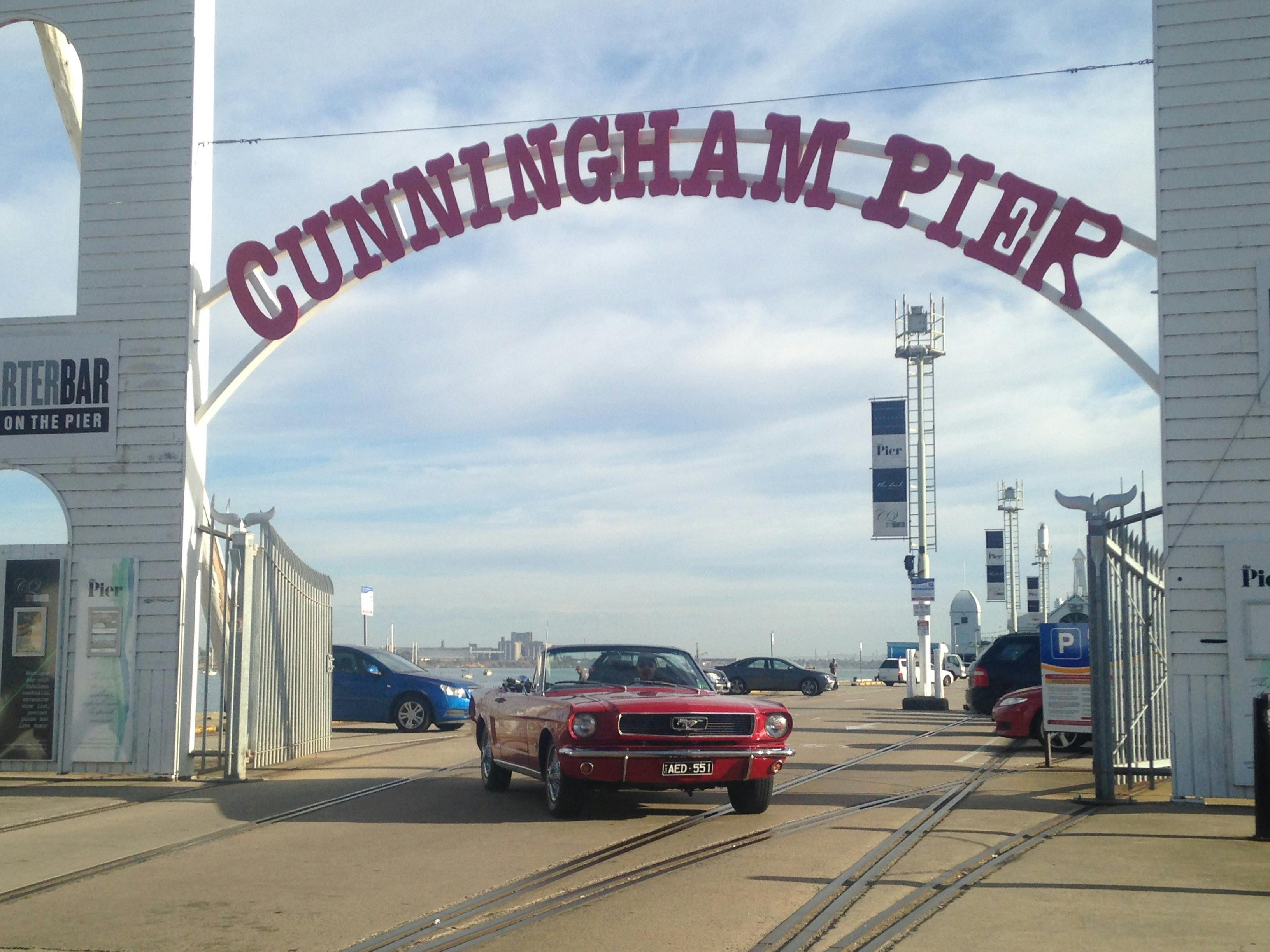 Historic Cunningham Pier Geelong with vintage Mustang convertible