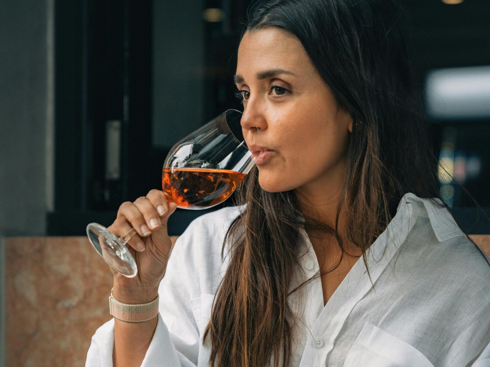 Woman enjoying a glass of wine