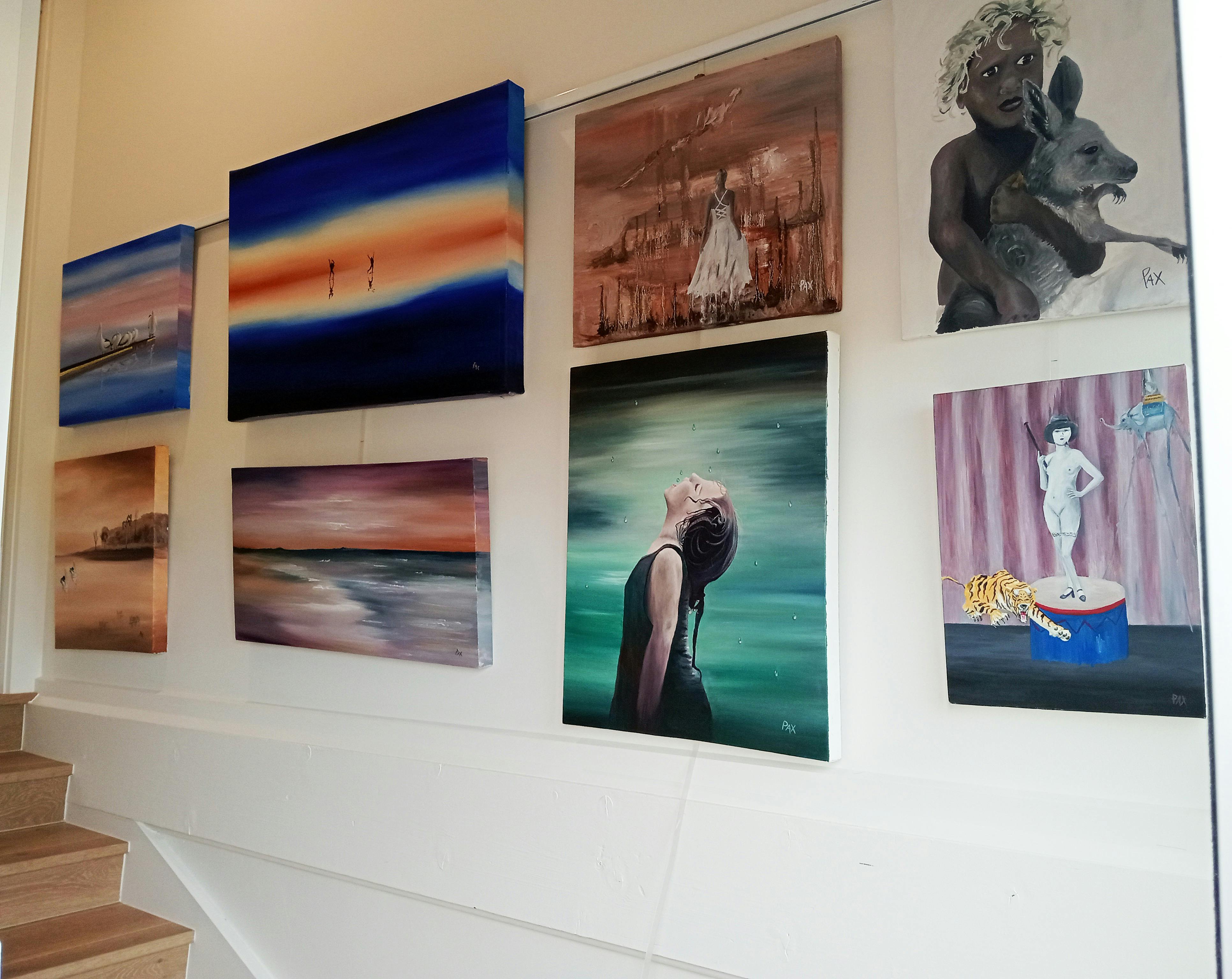 Pax Art Studio Gallery; Stair case wall display Paintings on wall