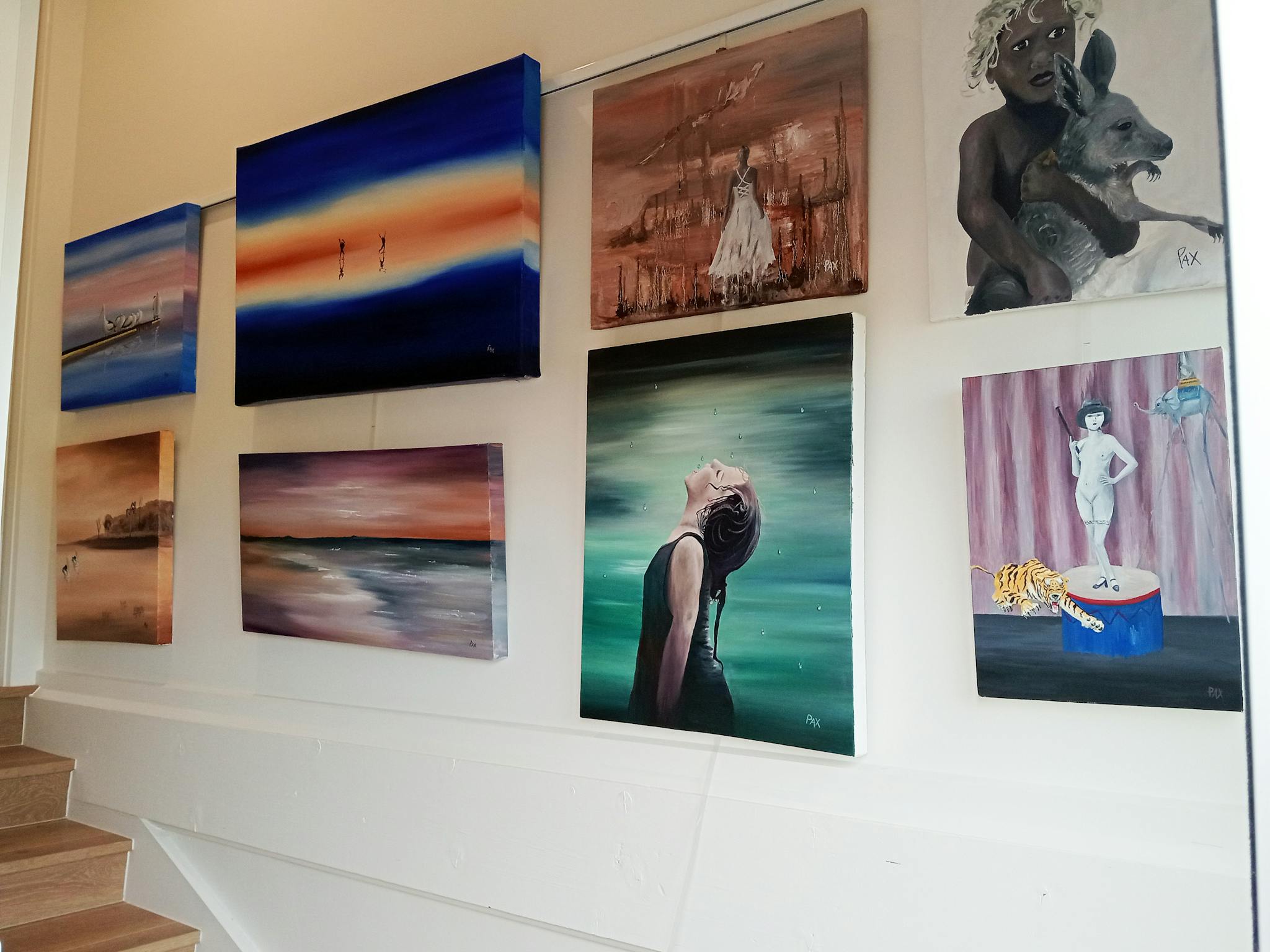 Pax Art Studio Gallery; Stair case wall display Paintings on wall