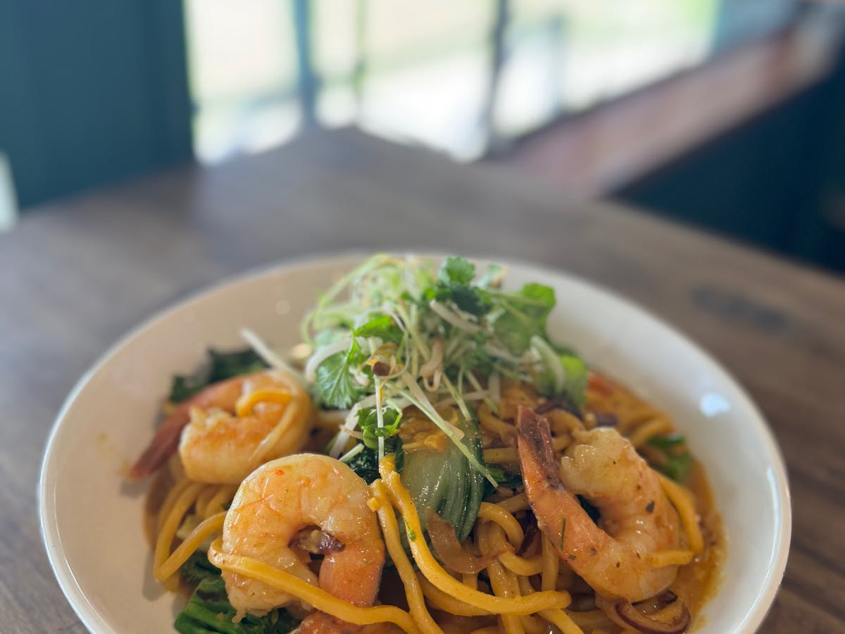 Prawns, red onion, broccolini, bok choy, noodles in a satay sauce
