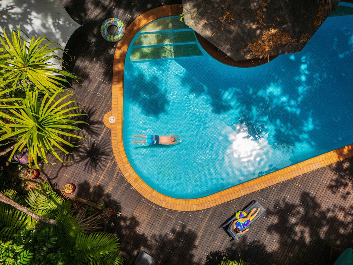 Diving into the resort pool
