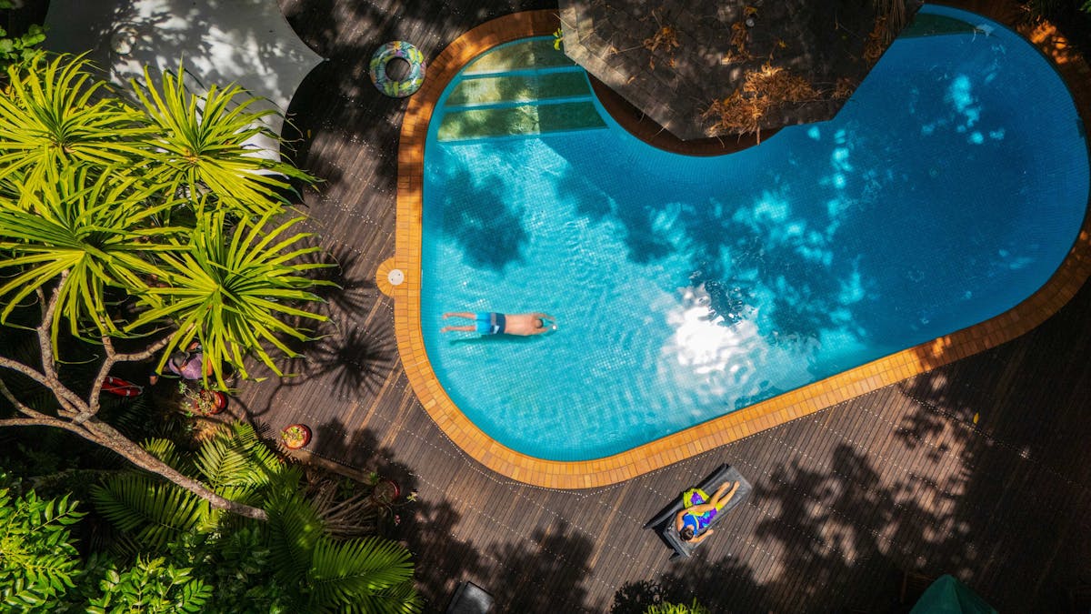 Diving into the resort pool
