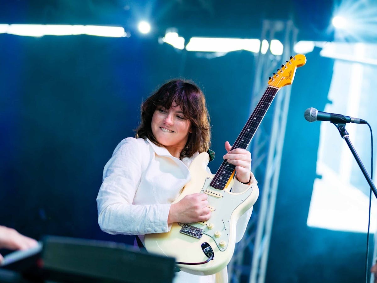 Woman playing guitar
