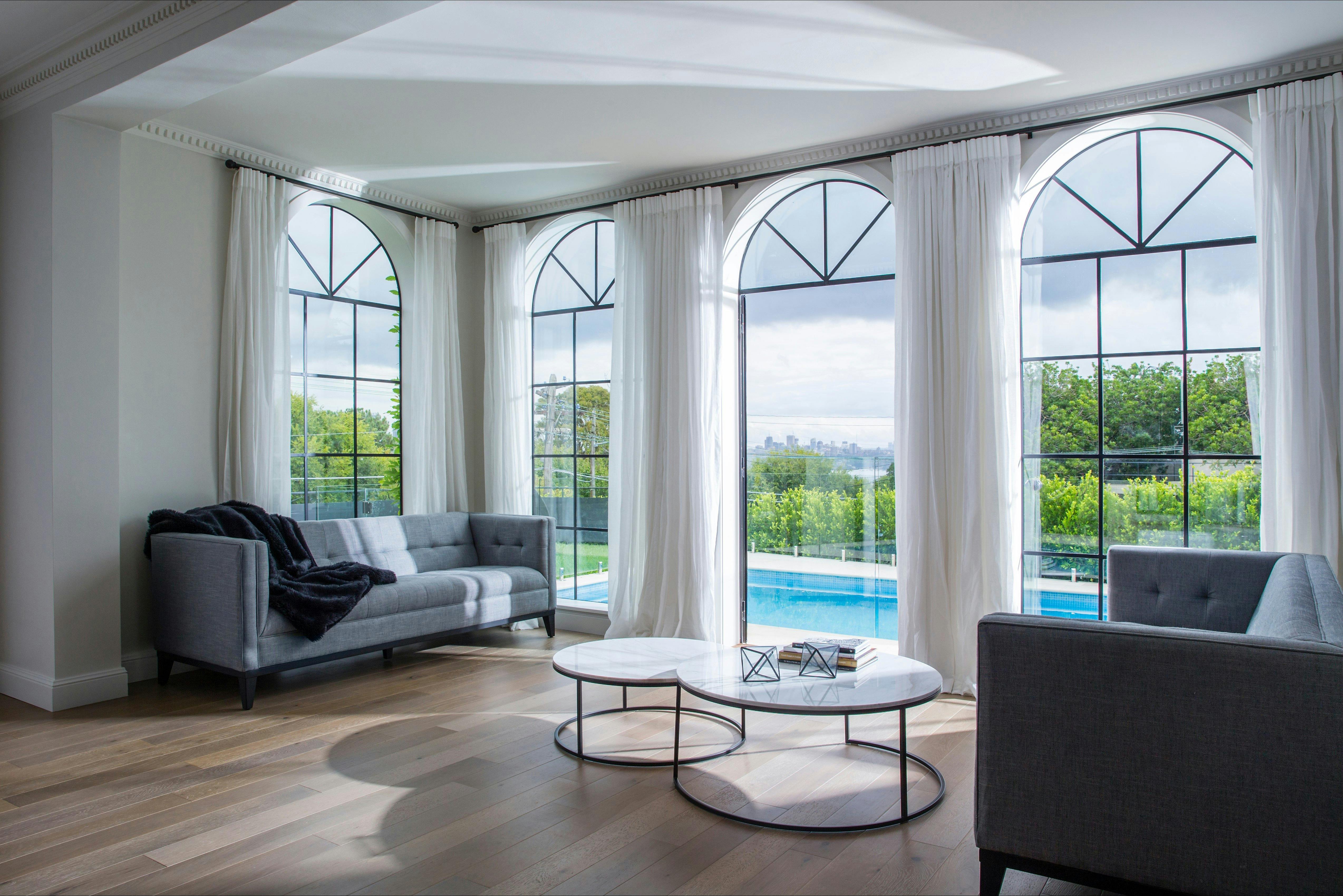 Living room giving views to the outdoor swimming pool