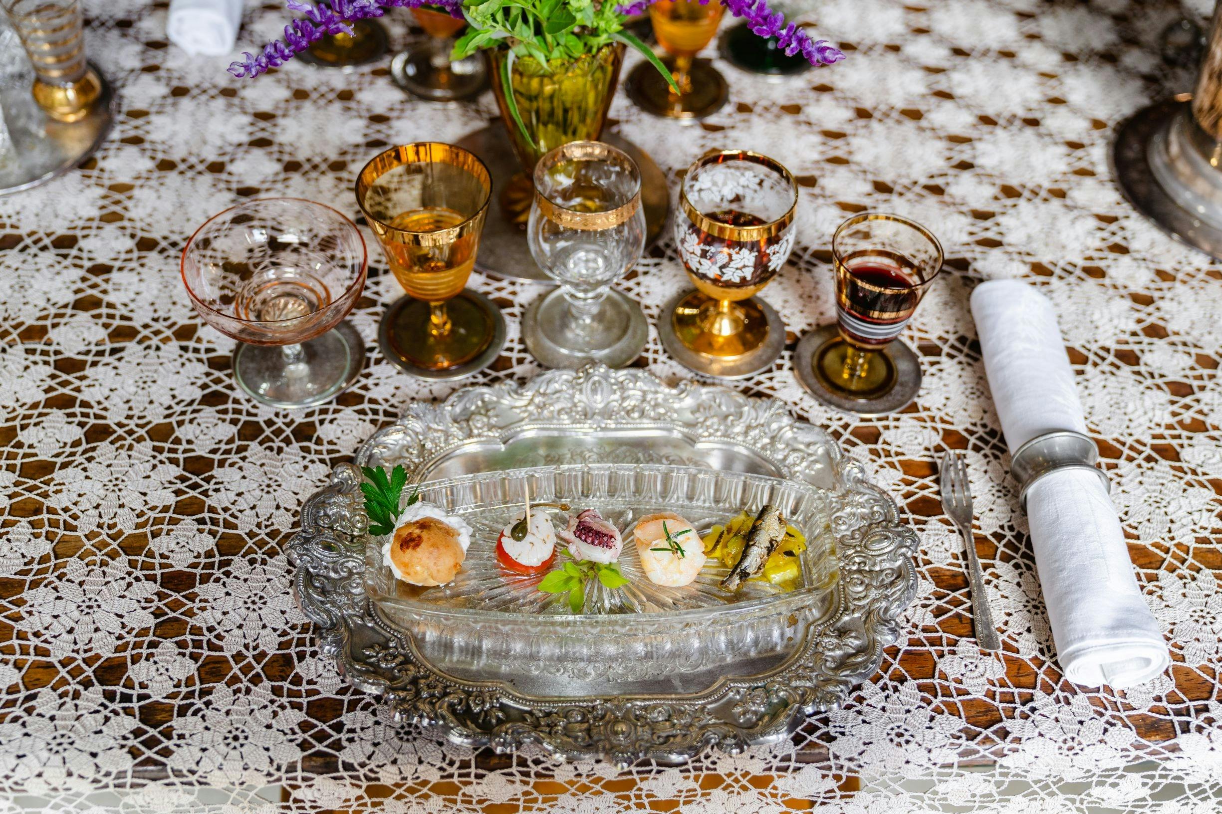 Local seafood paired to 5 wines with vintage decore