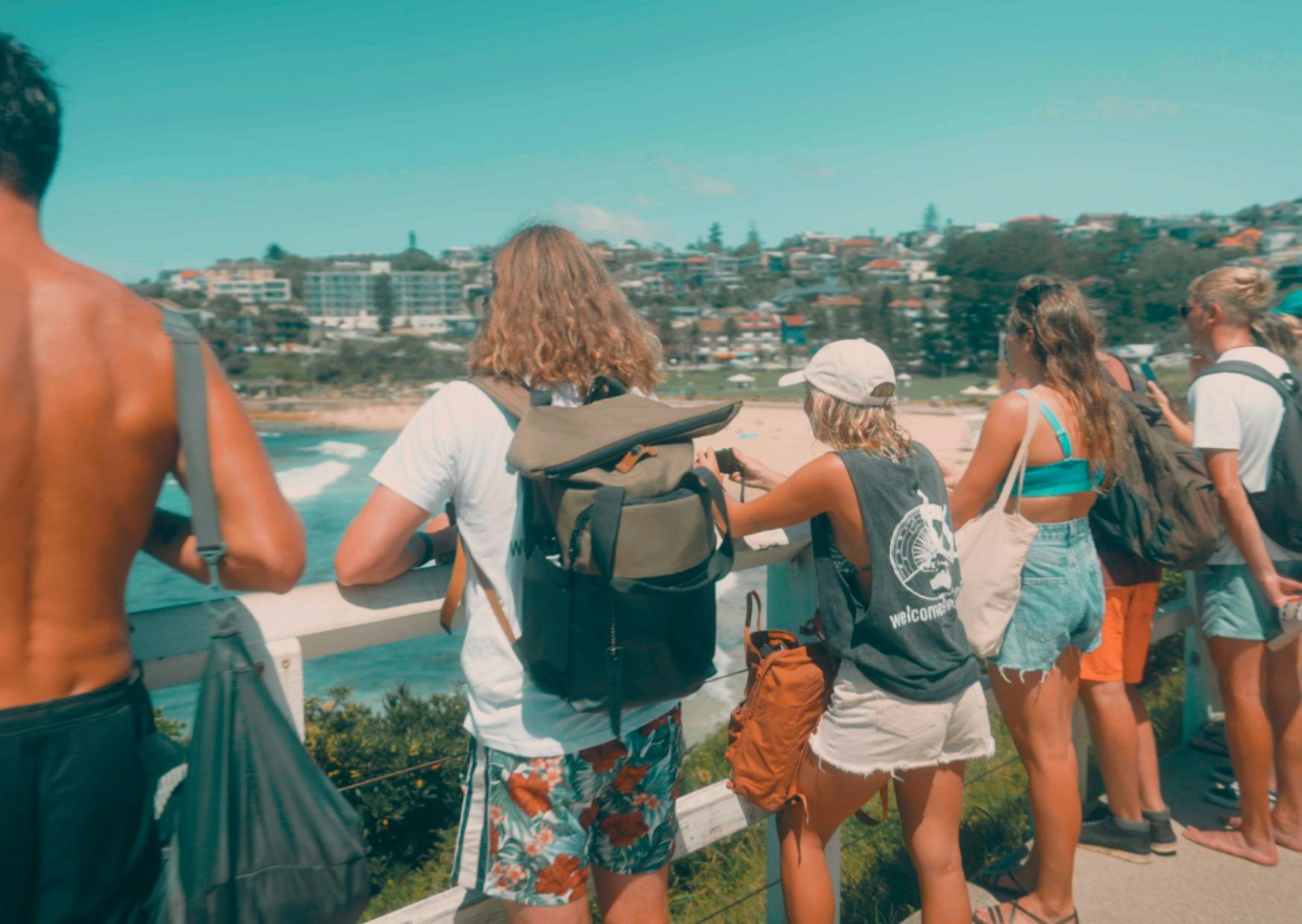 A group of people with the backdrop of Bondi Beach