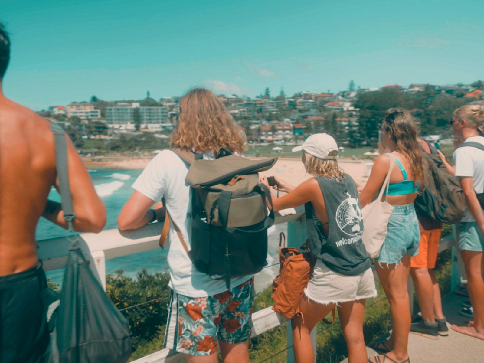 A group of people with the backdrop of Bondi Beach