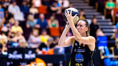 UC Capitals player shooting the basketball.