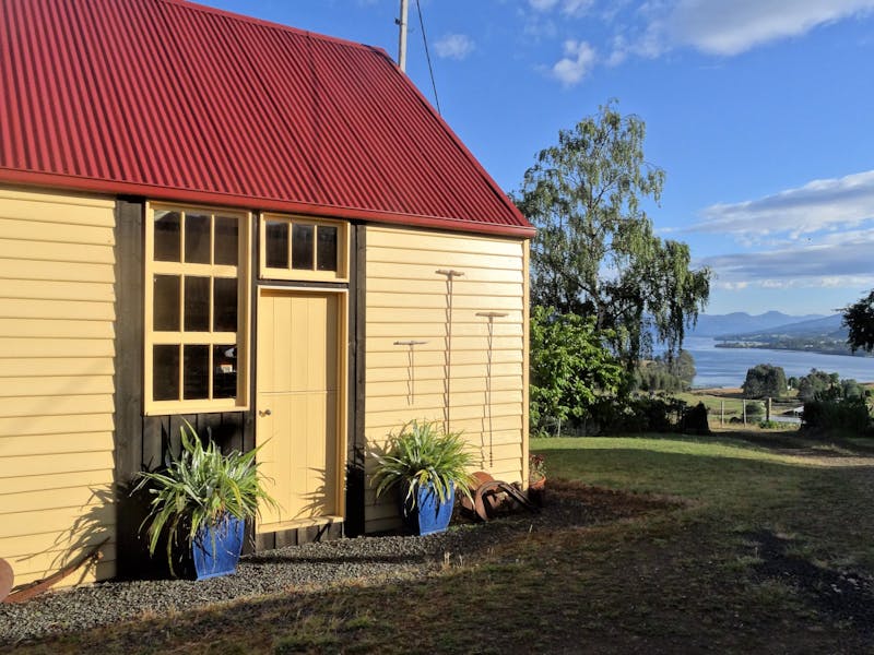 Studio waterloo is a historic apple packing shed with views down the Huon River