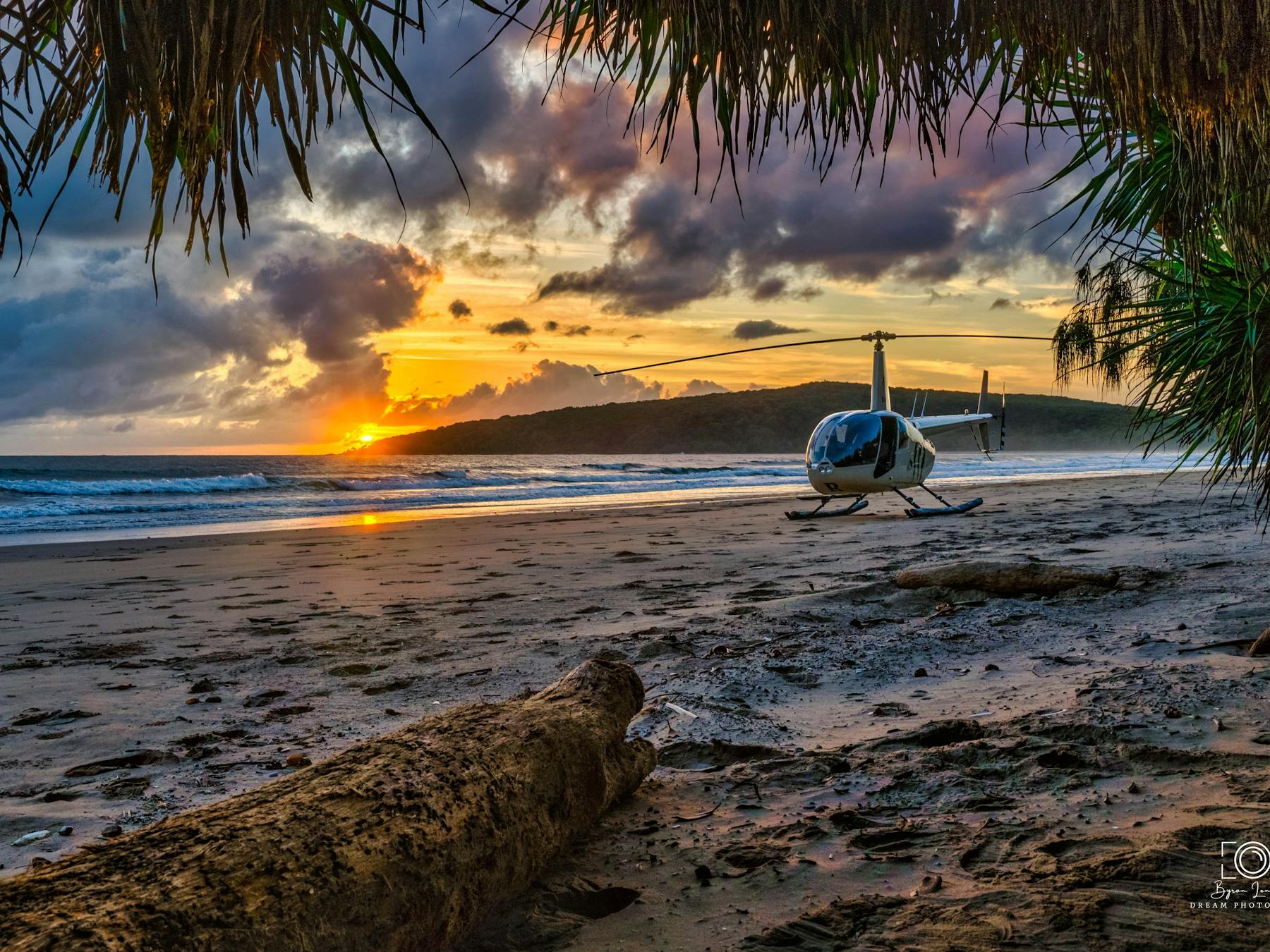Sunrise over a remote beach off the headland and - stunning colours, RaptAir in the reflective glow.