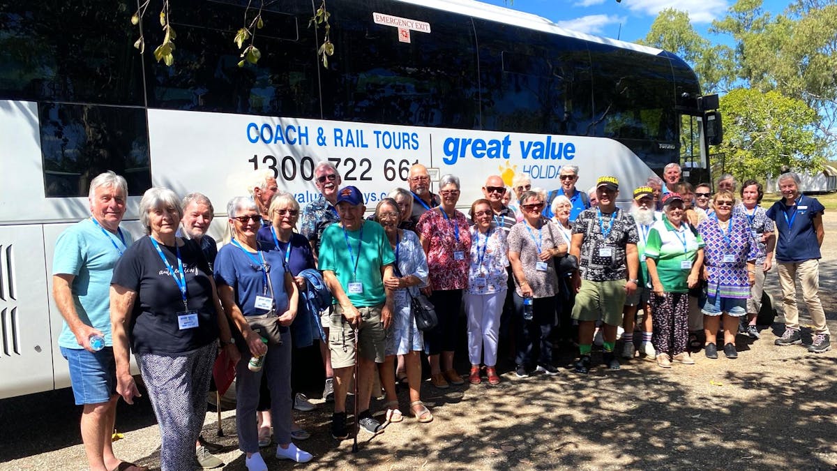 Group tour in front of GVH Coach