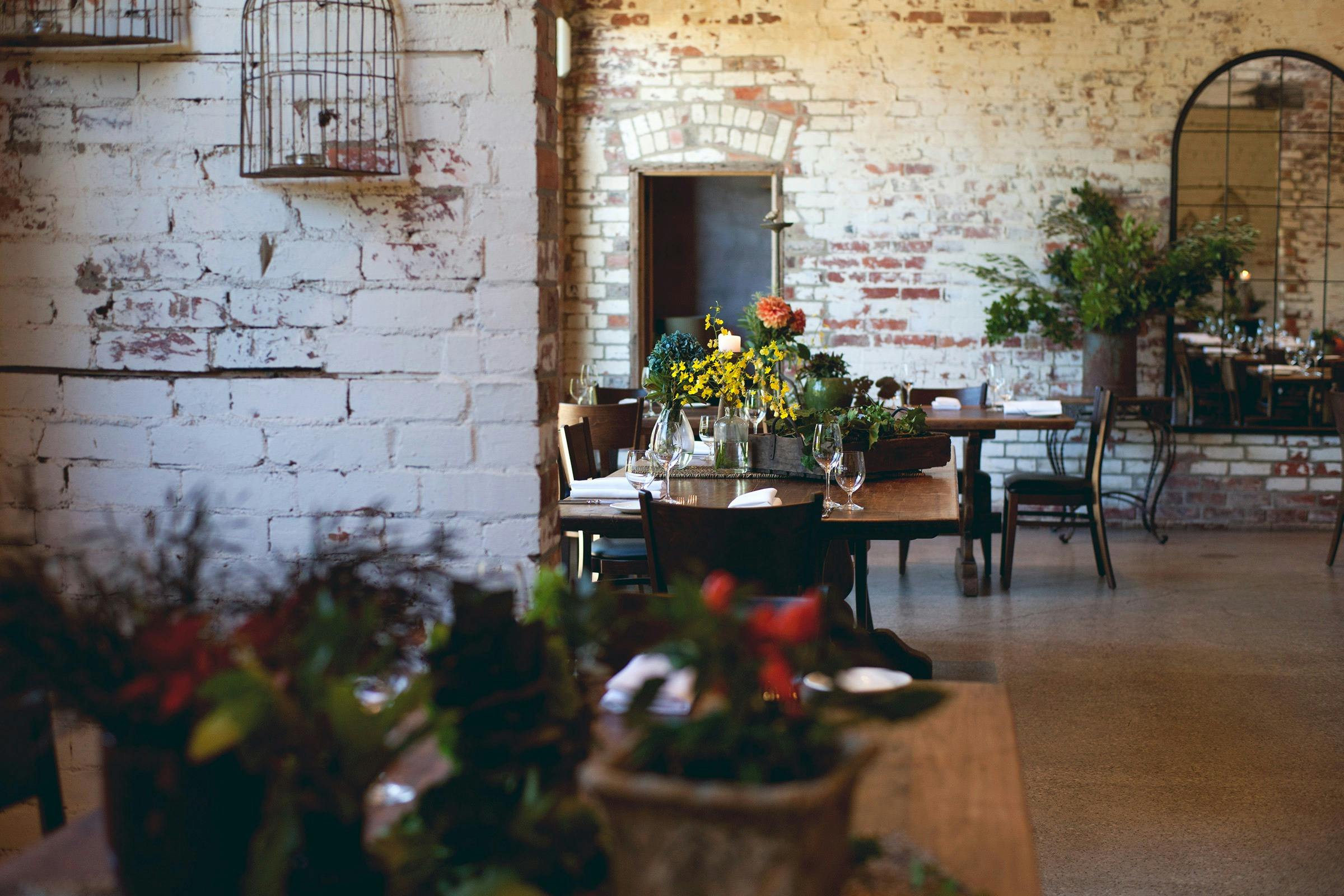 The Stables at Stones Interior - Spring flowers set on the tables